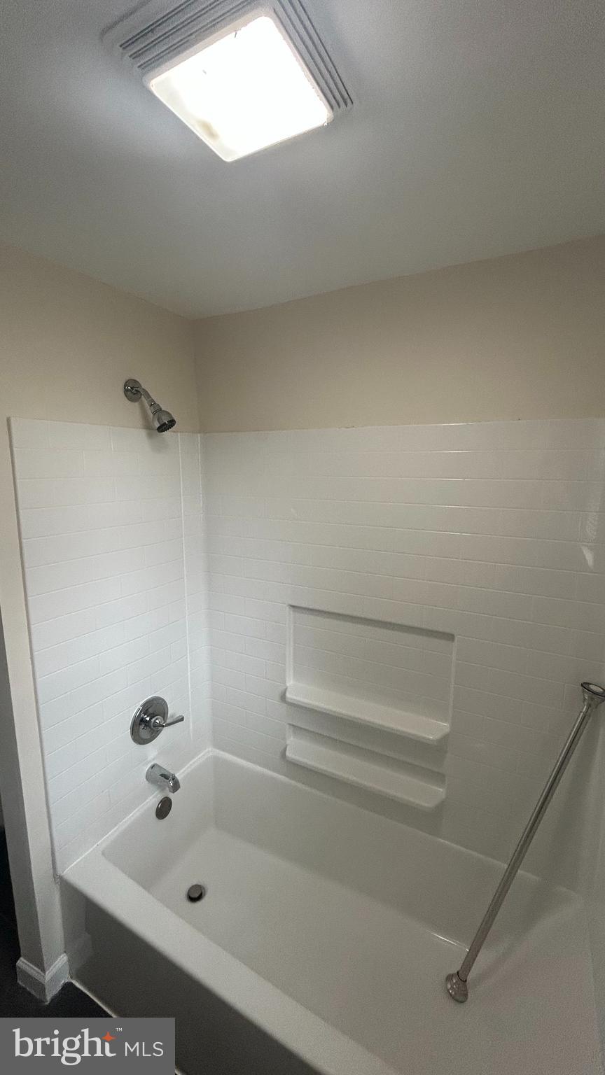 1022 Fox Chase Road, Unit B Jenkintown, PA 19046 - Photo 14 of 18 a bathroom with a bathtub