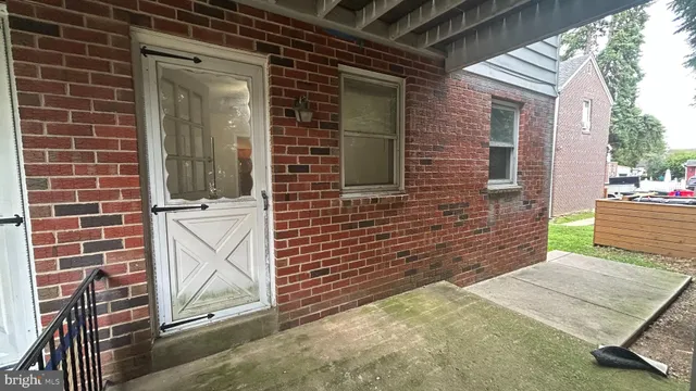 a view of a door of a house with a door
