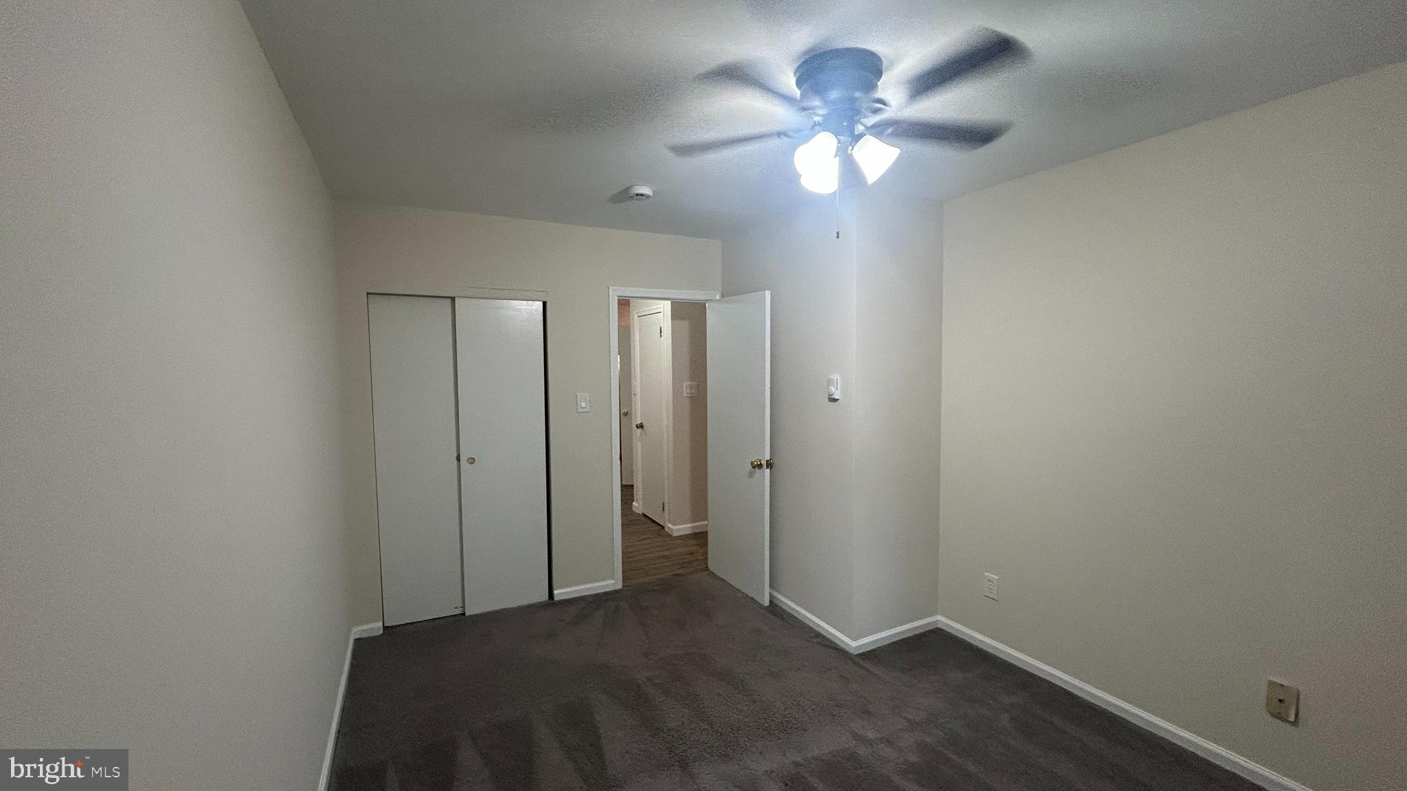 1022 Fox Chase Road, Unit B Jenkintown, PA 19046 - Photo 10 of 18 a view of an empty room with a fan