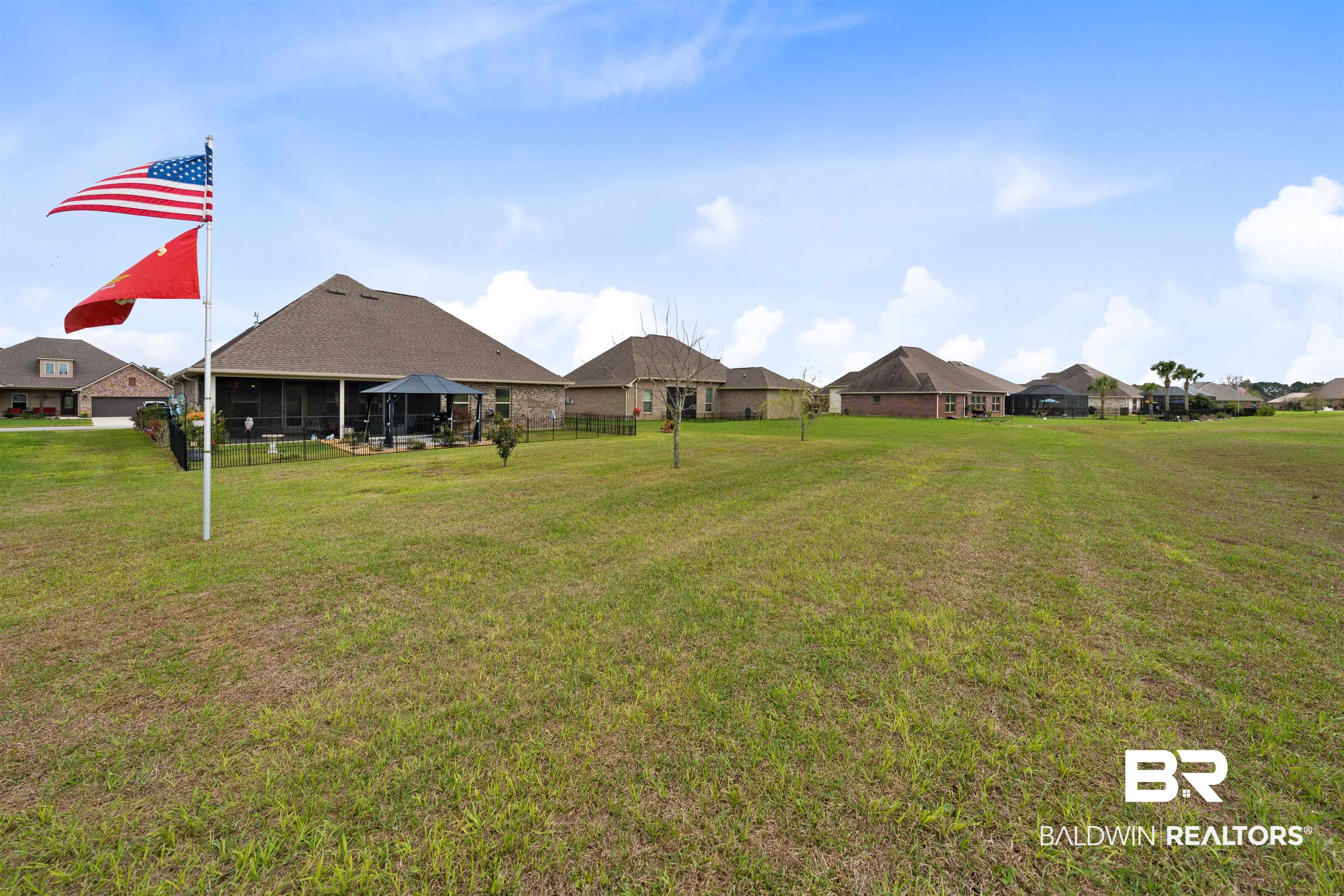 22512 Putter Lane Foley, AL 36535 - Photo 21 of 27 View of yard featuring a residential view