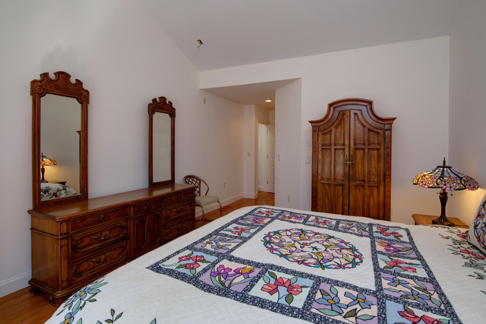 22 Stratford Ridge Mashpee, MA 02649 - Photo 14 of 35 a bedroom with a bed and a dresser