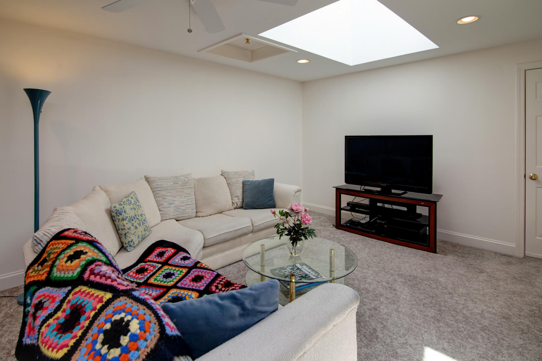 22 Stratford Ridge Mashpee, MA 02649 - Photo 18 of 35 a living room with furniture and a flat screen tv