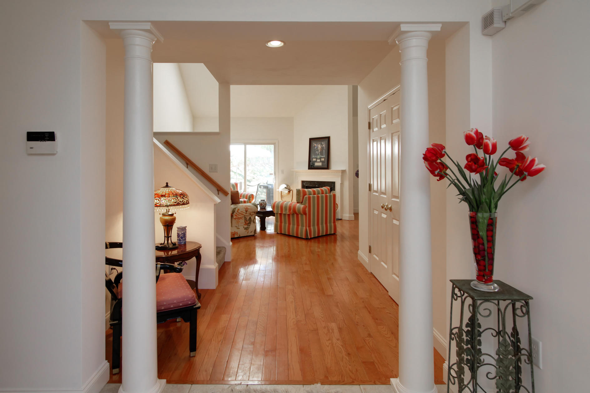 22 Stratford Ridge Mashpee, MA 02649 - Photo 2 of 35 a living room with furniture and a potted plant