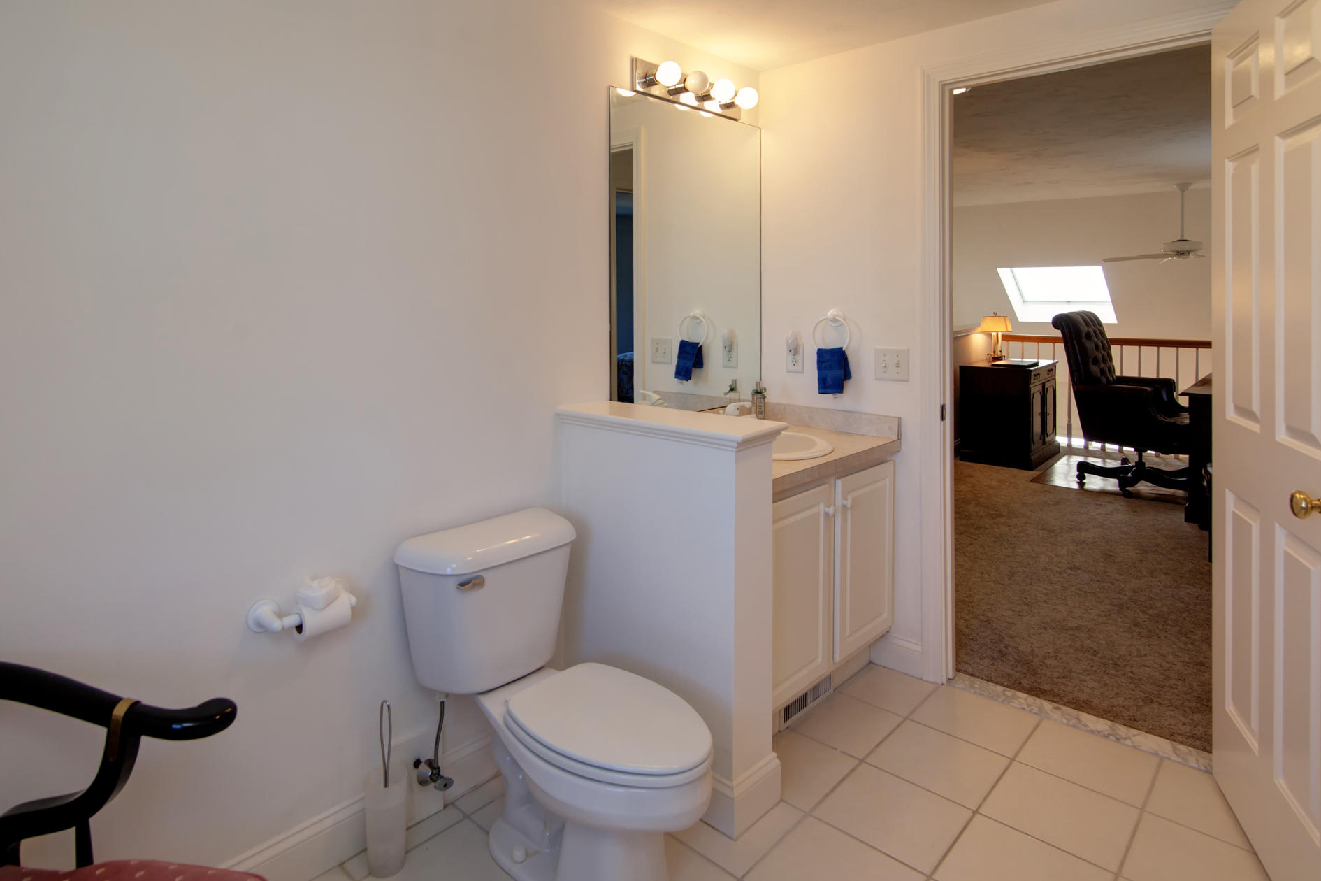 22 Stratford Ridge Mashpee, MA 02649 - Photo 23 of 35 a bathroom with a toilet sink and mirror
