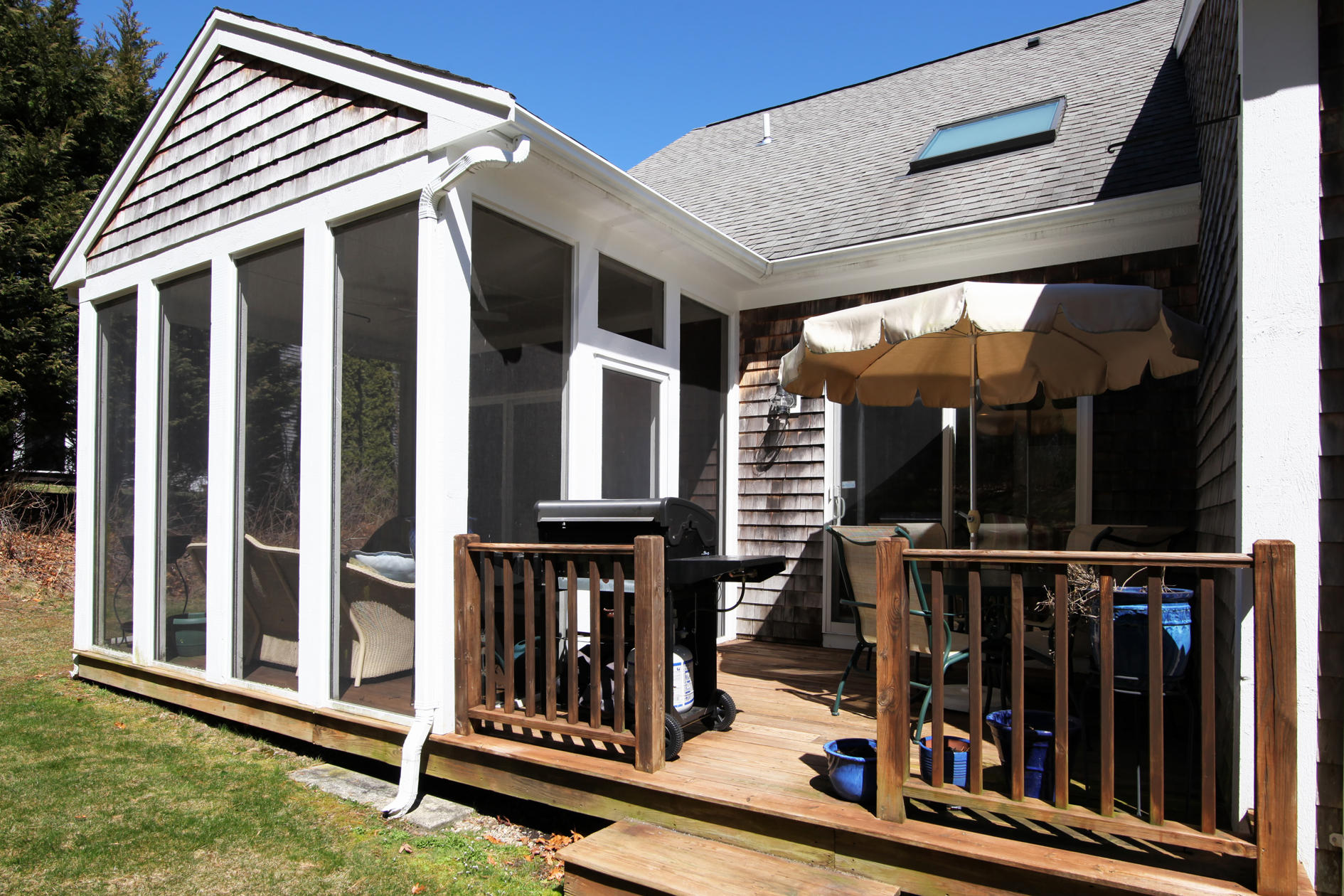 22 Stratford Ridge Mashpee, MA 02649 - Photo 24 of 35 a view of small house with backyard and deck