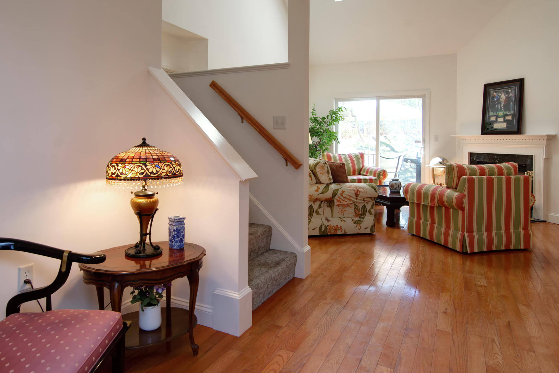22 Stratford Ridge Mashpee, MA 02649 - Photo 3 of 35 a living room with furniture and a chandelier