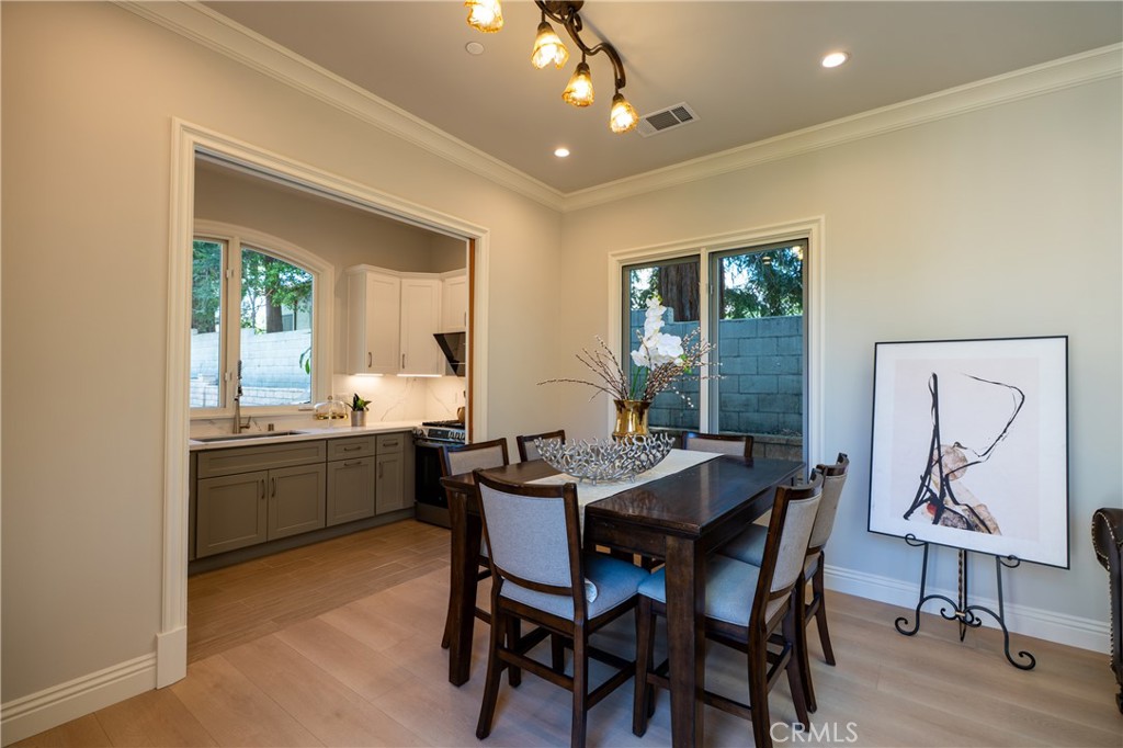 894 Fallen Leaf Road Arcadia, CA 91006 - Photo 5 of 28 a view of a dining room with furniture window and wooden floor