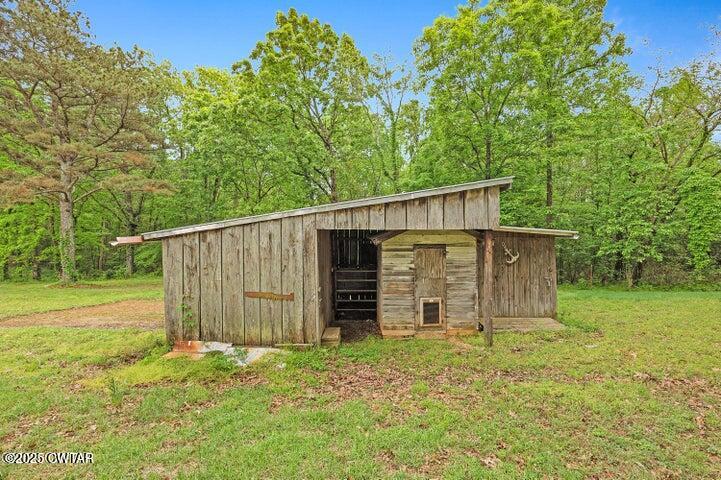 5060 Enville Road Henderson, TN 38340 - Photo 14 of 17 a view of a backyard