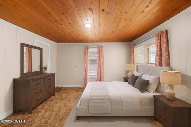 a spacious bedroom with a bed and wooden floor