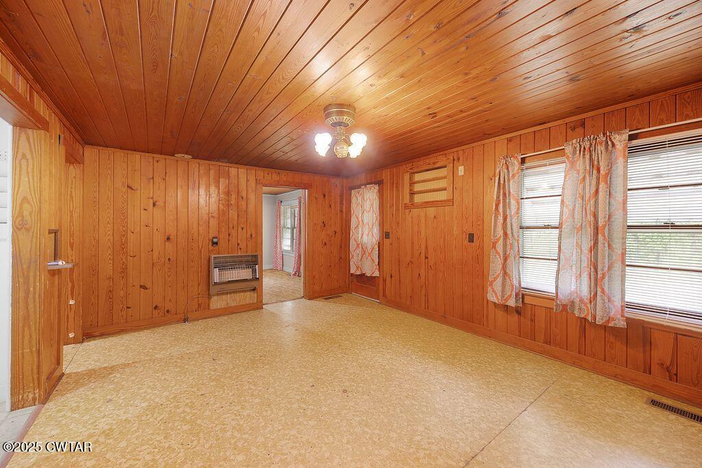 5060 Enville Road Henderson, TN 38340 - Photo 6 of 17 a view of an empty room with a window
