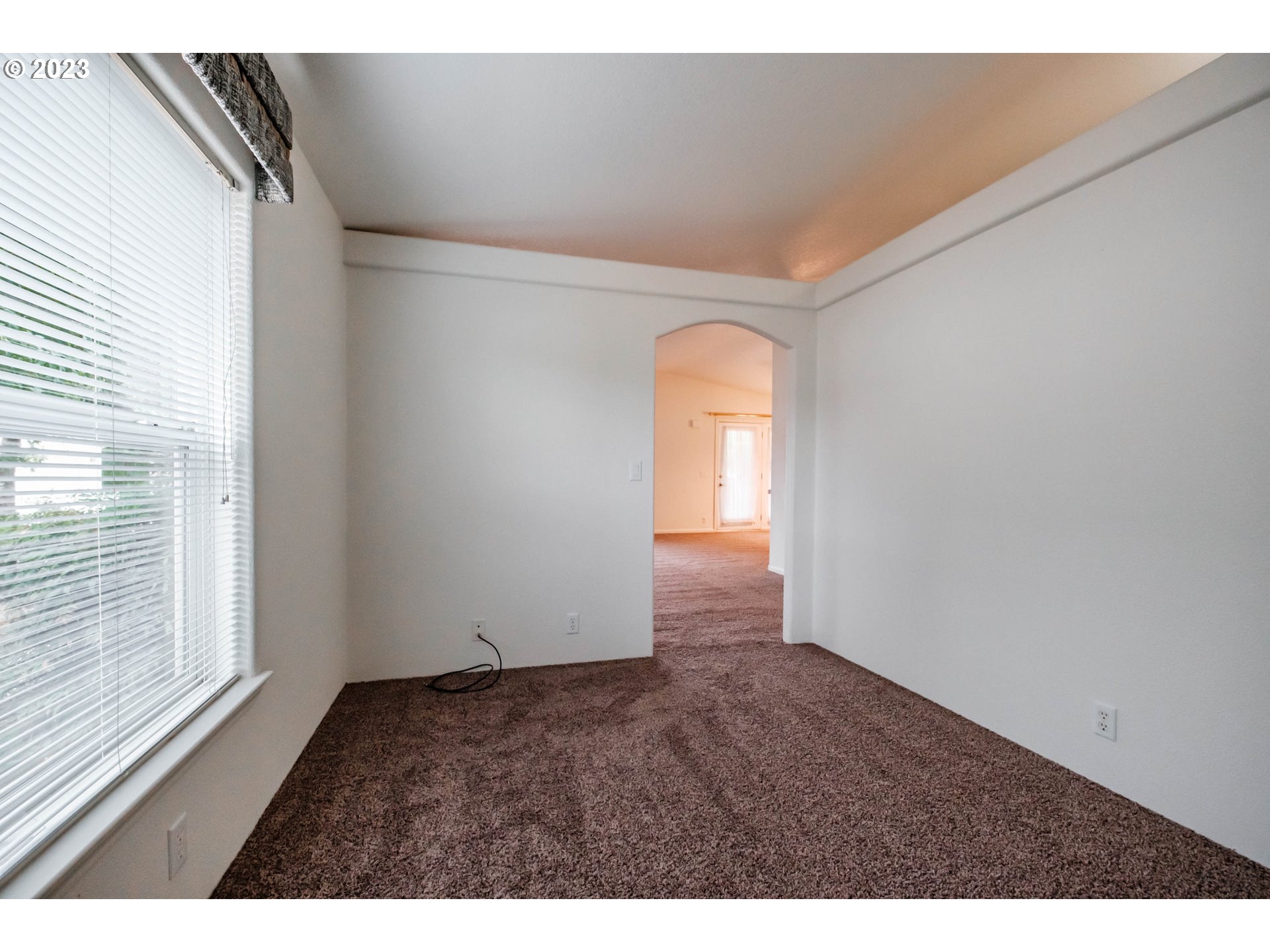 2434 Maia Loop Springfield, OR 97477 - Photo 12 of 36 a view of an empty room and window
