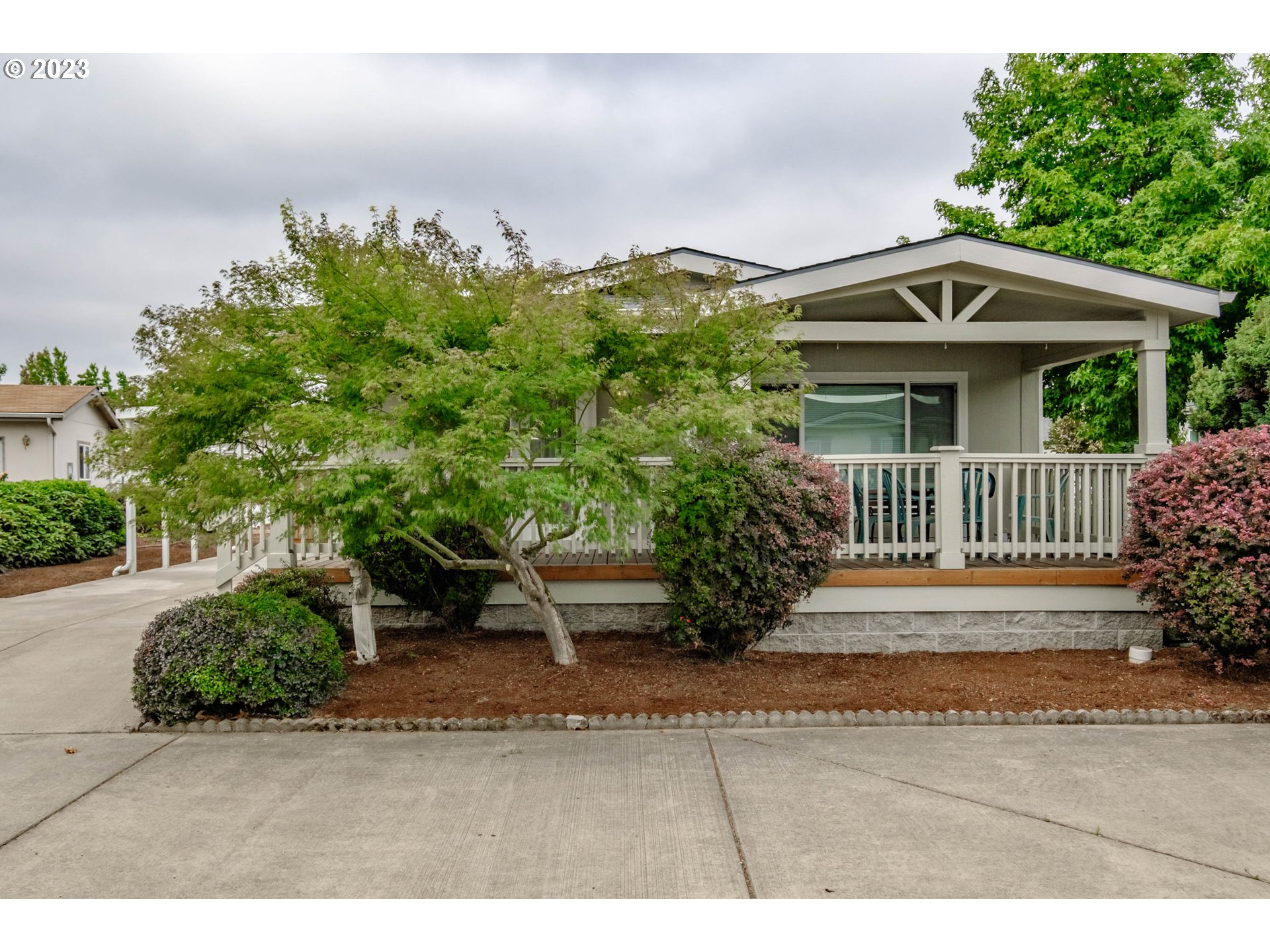 2434 Maia Loop Springfield, OR 97477 - Photo 2 of 36 a front view of a house with a yard