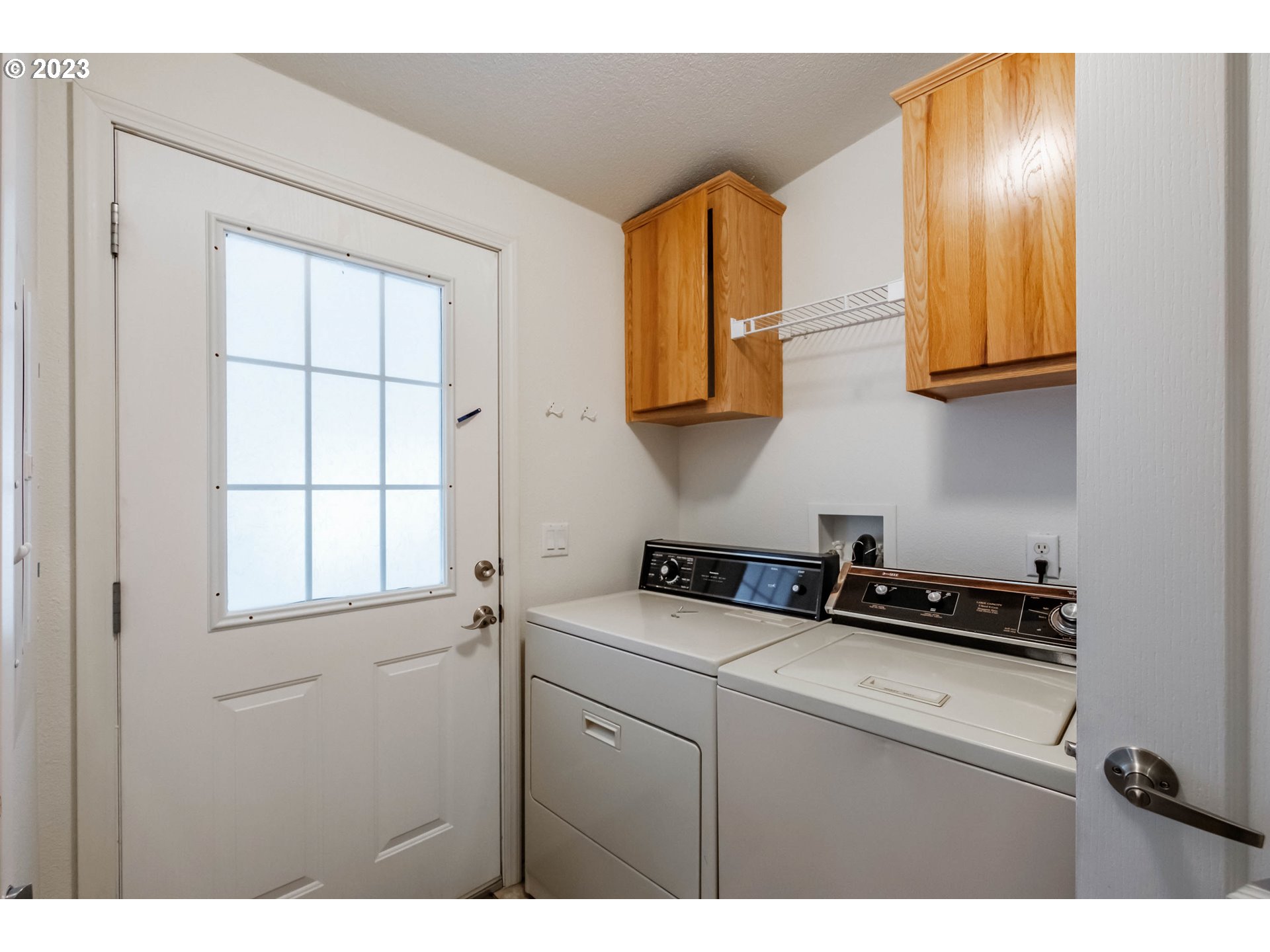 2434 Maia Loop Springfield, OR 97477 - Photo 27 of 36 a kitchen with a cabinets and wooden floor