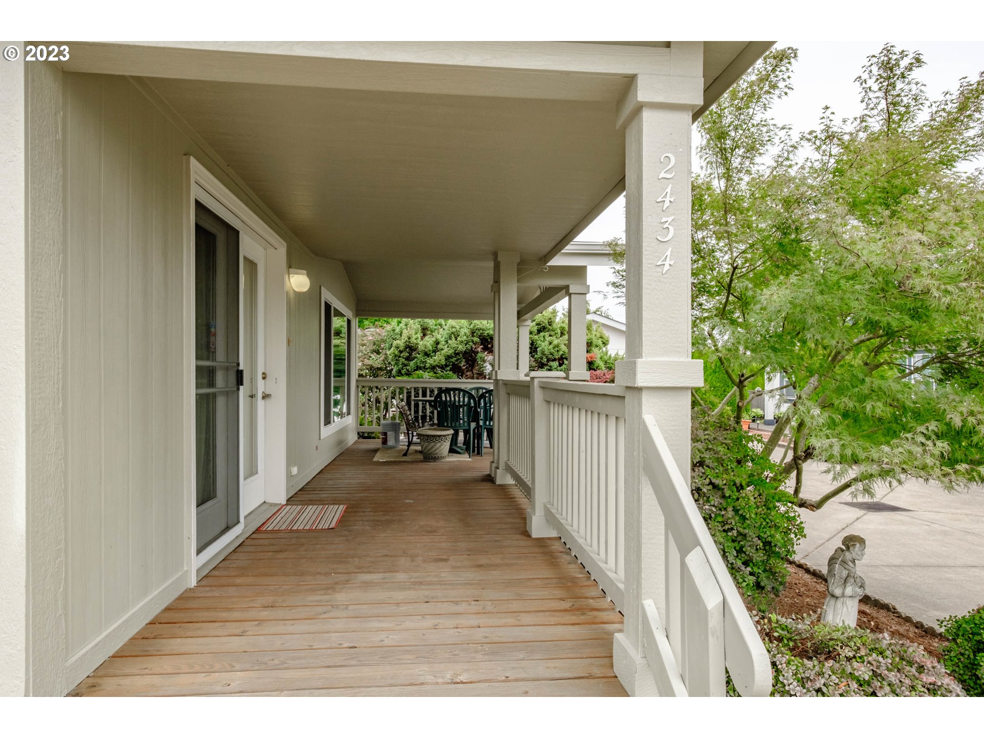 2434 Maia Loop Springfield, OR 97477 - Photo 29 of 36 a balcony with wooden floor and outdoor space