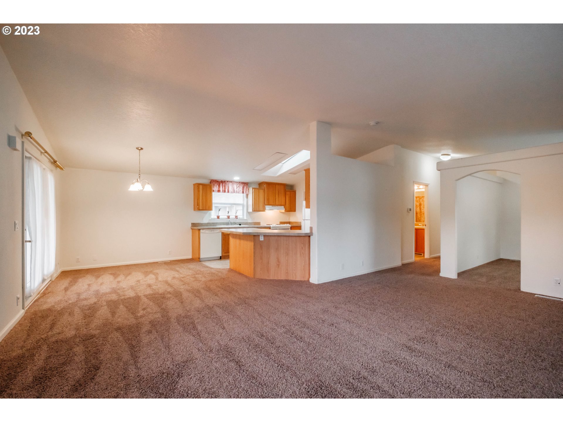 2434 Maia Loop Springfield, OR 97477 - Photo 4 of 36 a view of a big room with a kitchen