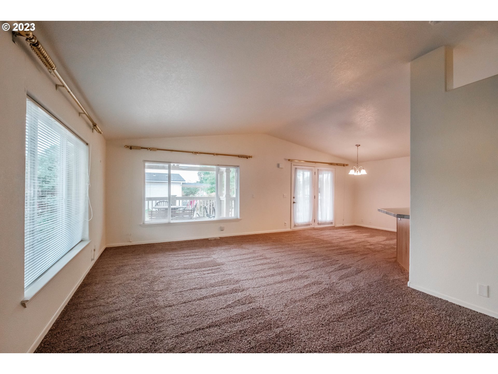 2434 Maia Loop Springfield, OR 97477 - Photo 5 of 36 a view of an empty room and window