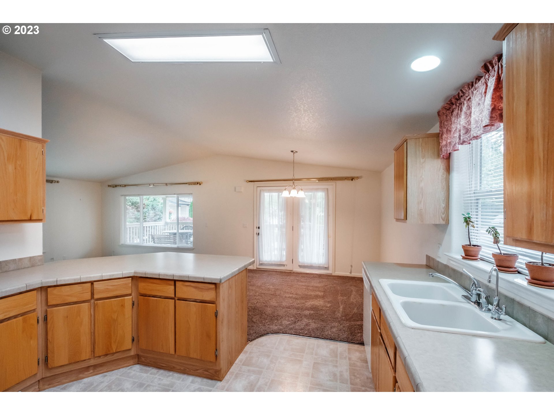 2434 Maia Loop Springfield, OR 97477 - Photo 8 of 36 a bathroom with a sink a vanity and a large mirror