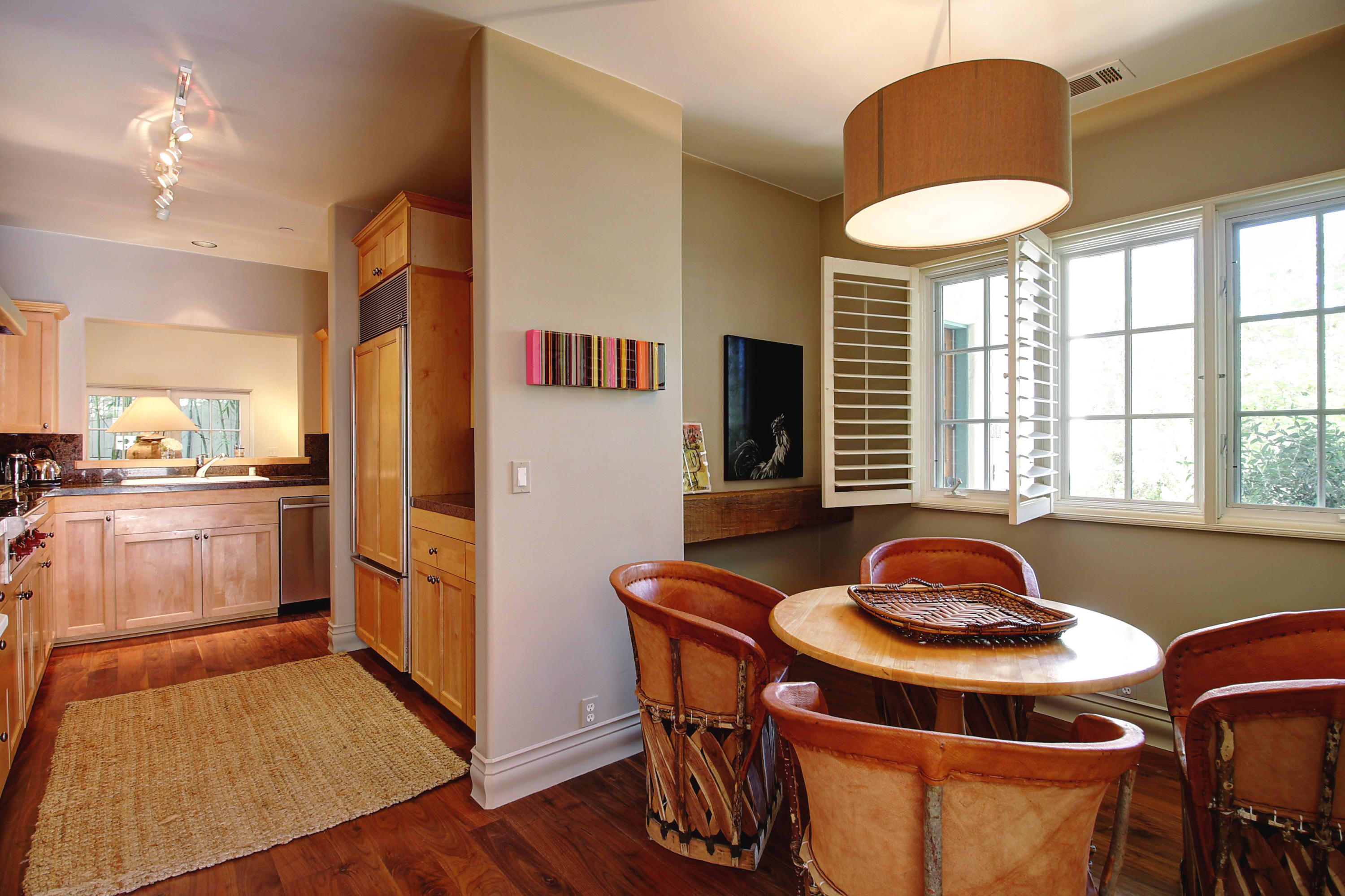 71 Olive Mill Road Montecito, CA 93108 - Photo 6 of 22 a kitchen with granite countertop a sink and a refrigerator