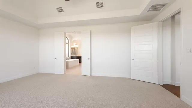 a view of an empty room and window