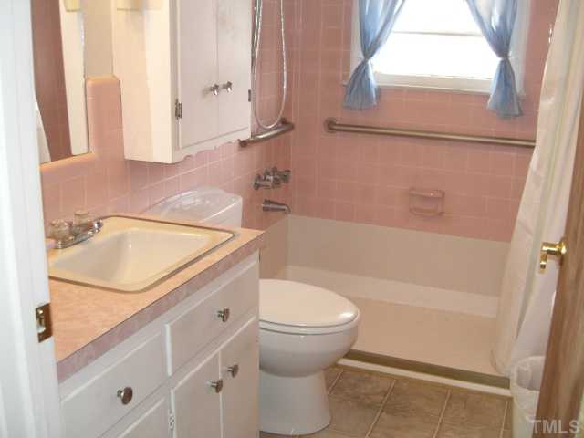 2994 Old Stage Road South Erwin, NC 28339 - Photo 9 of 12 Don't LIke Pink? Remove the tile and replace with drywall to be painted ANY color!