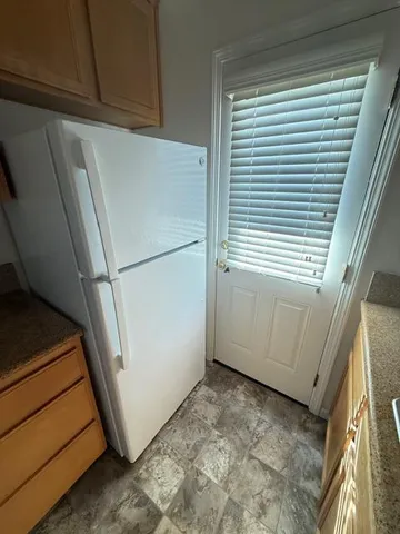 a view of a storage in front of a window