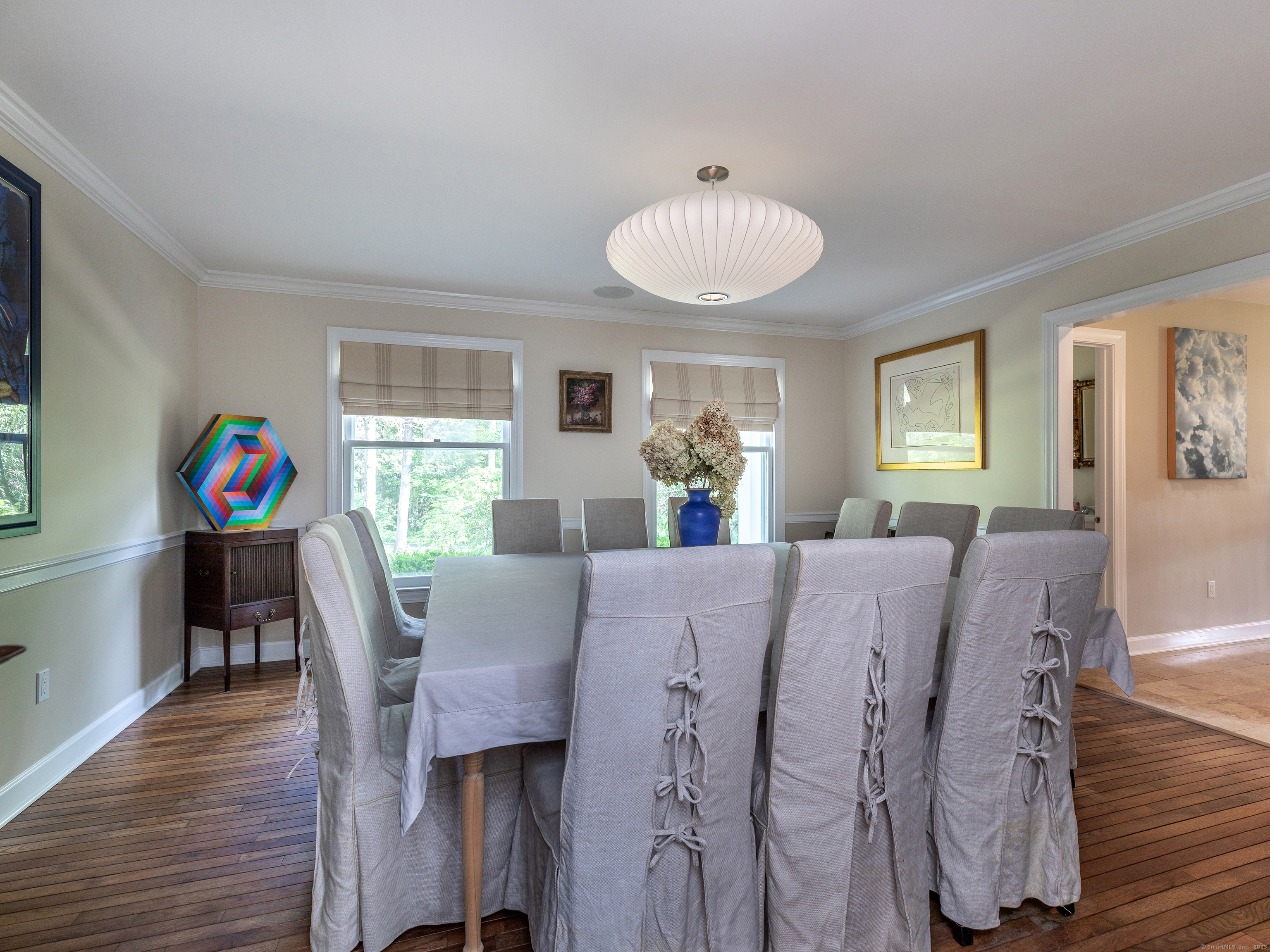 31 Hickory Lane Roxbury, CT 06783 - Photo 15 of 37 a view of a dining room with furniture and a chandelier