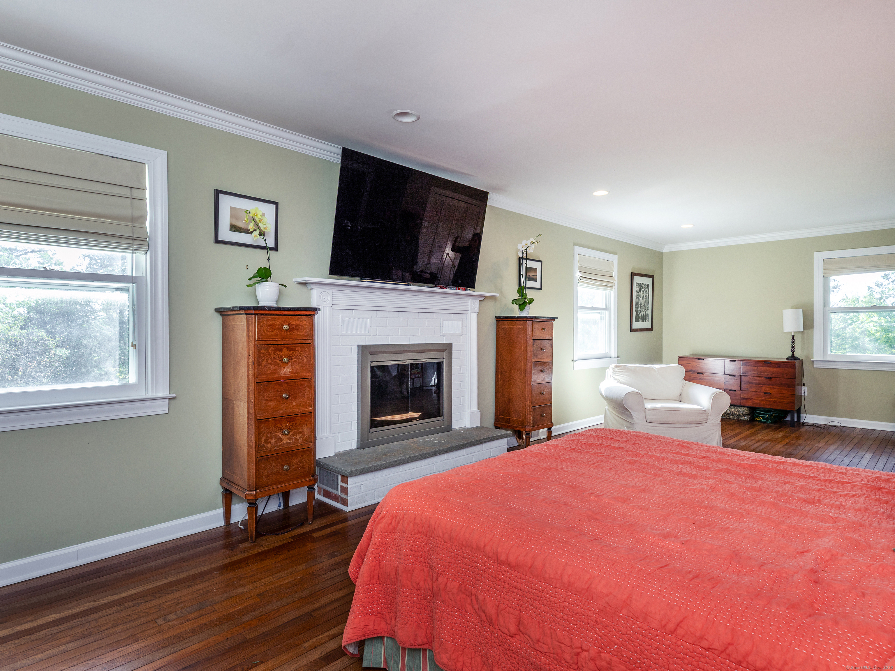 31 Hickory Lane Roxbury, CT 06783 - Photo 16 of 37 a spacious bedroom with a bed and a flat screen tv