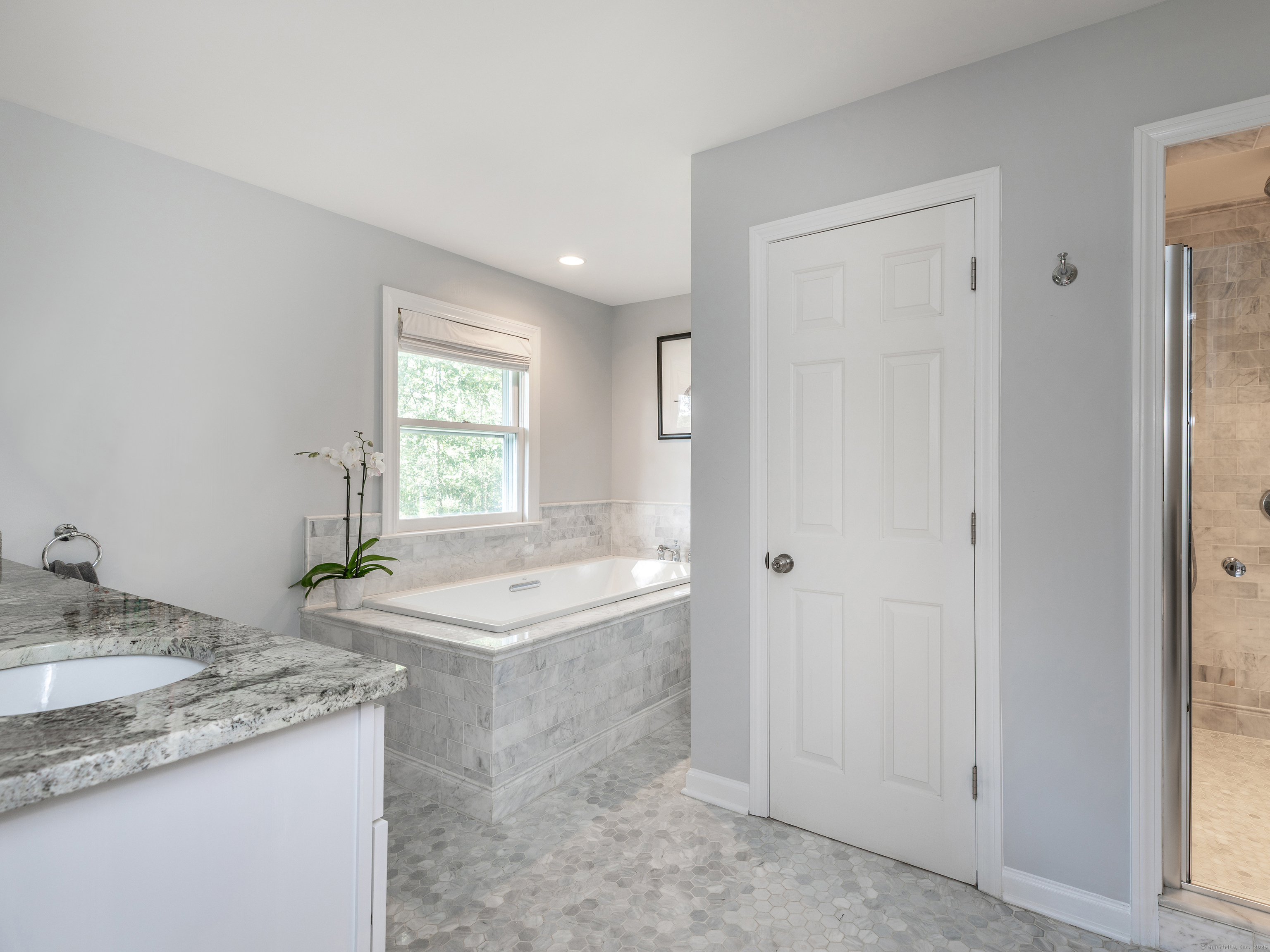 31 Hickory Lane Roxbury, CT 06783 - Photo 17 of 37 a bathroom with a granite countertop tub sink and mirror