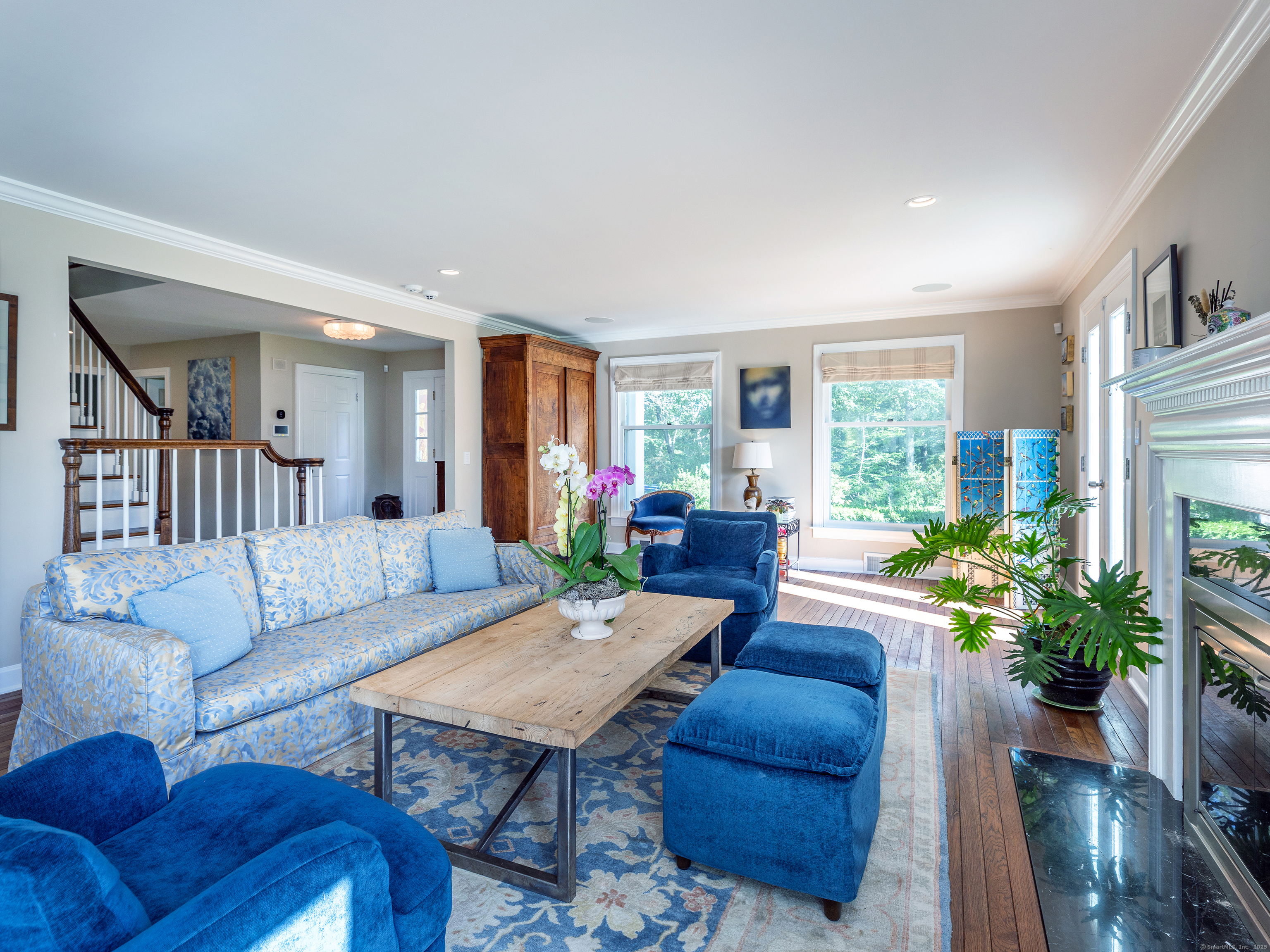 31 Hickory Lane Roxbury, CT 06783 - Photo 23 of 37 a living room with furniture potted plant and a large window