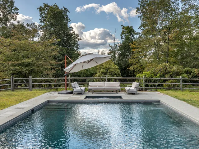 a view of a house with swimming pool