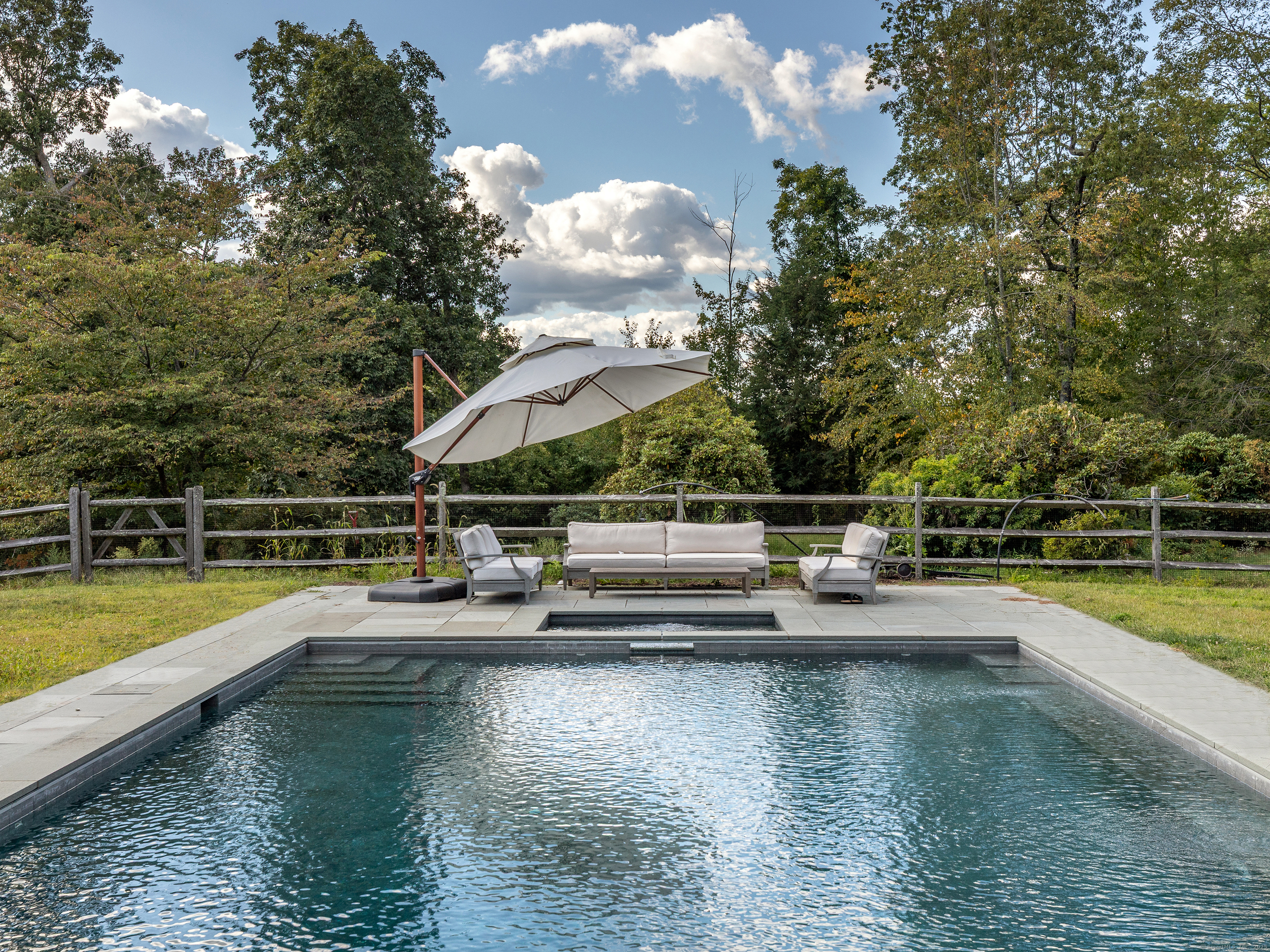 31 Hickory Lane Roxbury, CT 06783 - Photo 3 of 37 a view of a house with swimming pool