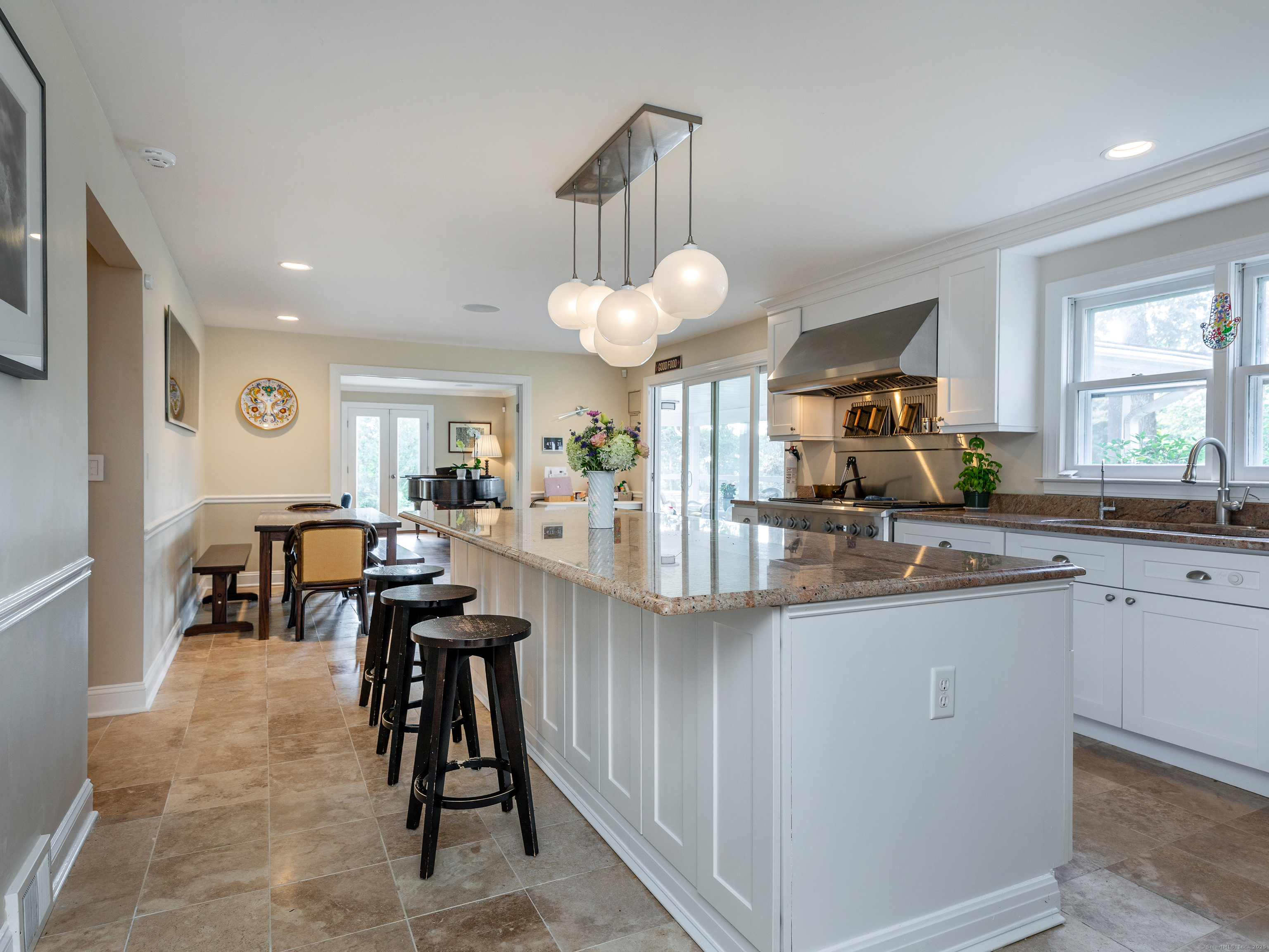 31 Hickory Lane Roxbury, CT 06783 - Photo 10 of 37 a kitchen with kitchen island granite countertop lots of counter top space and dining table