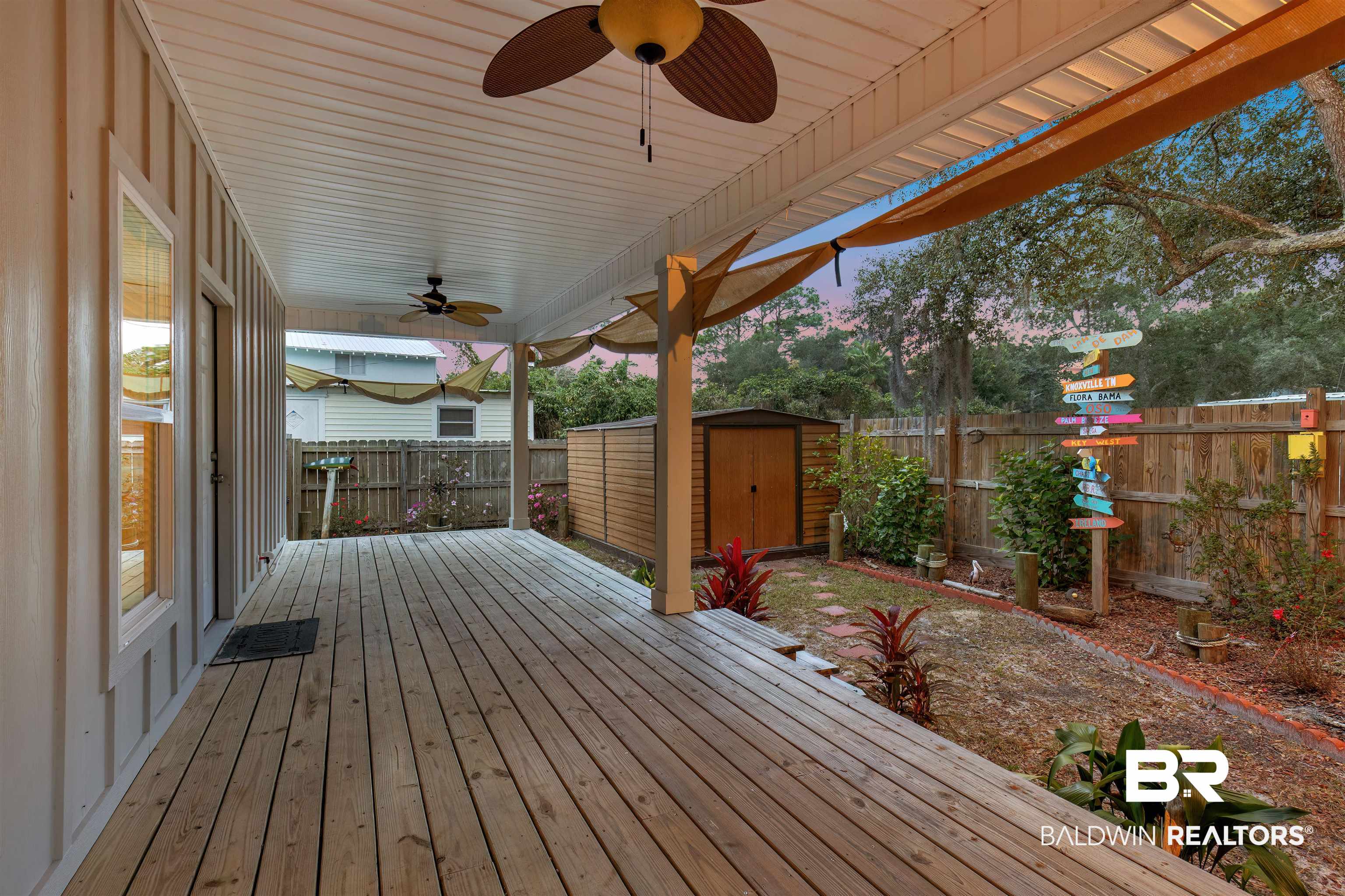5625 Georgia Street Orange Beach, AL 36561 - Photo 24 of 30 Wooden deck with ceiling fan and a storage unit