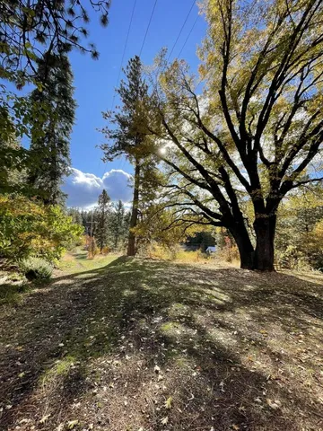 a view of a house with a snow in the yard