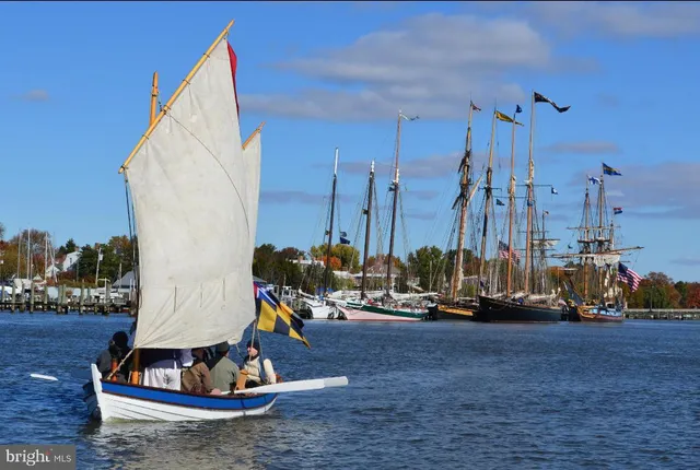 a view of a swimming pool with sitting area