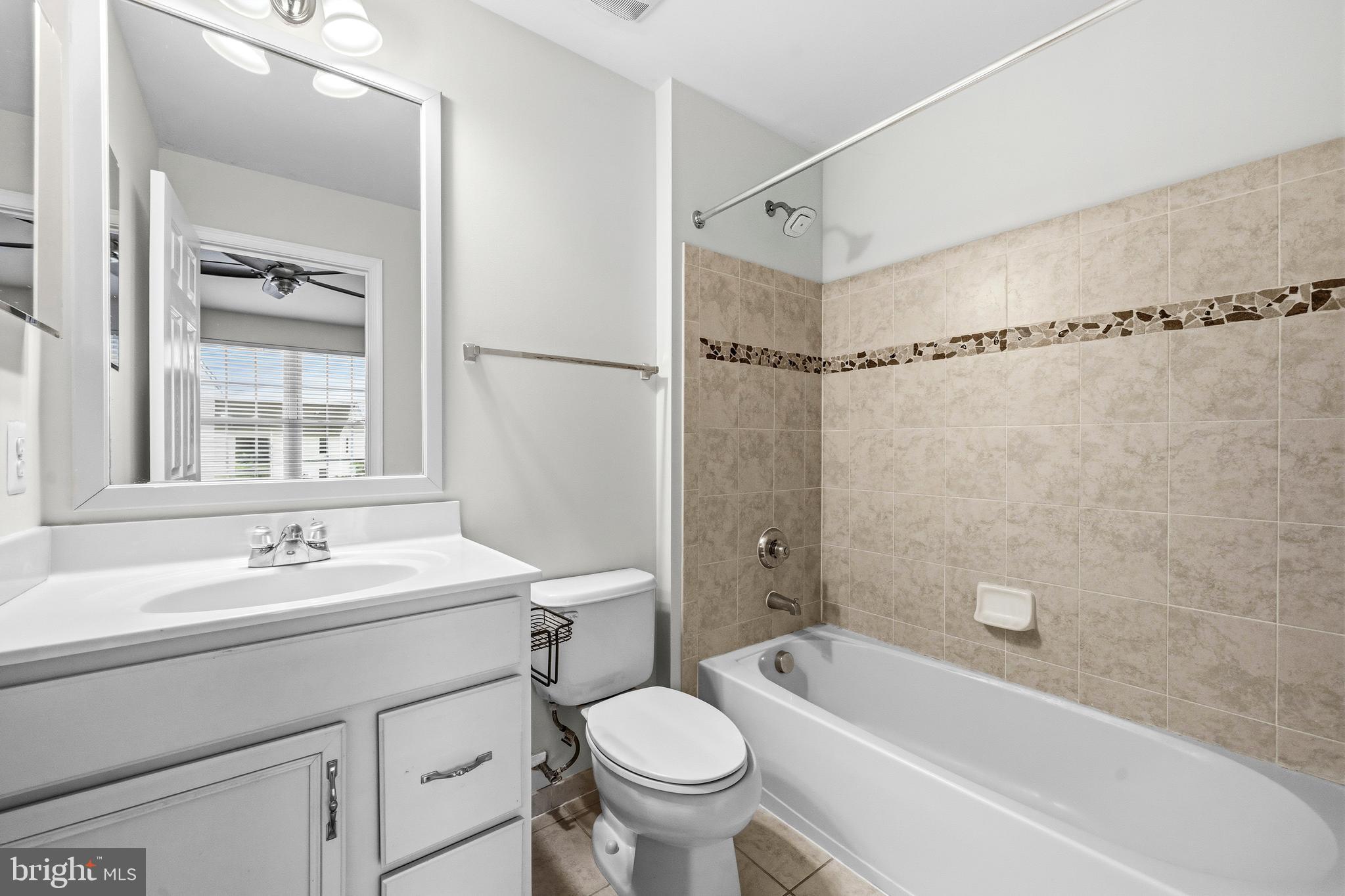 25154 Monteith Terrace Chantilly, VA 20152 - Photo 17 of 40 a bathroom with a sink toilet bathtub and shower