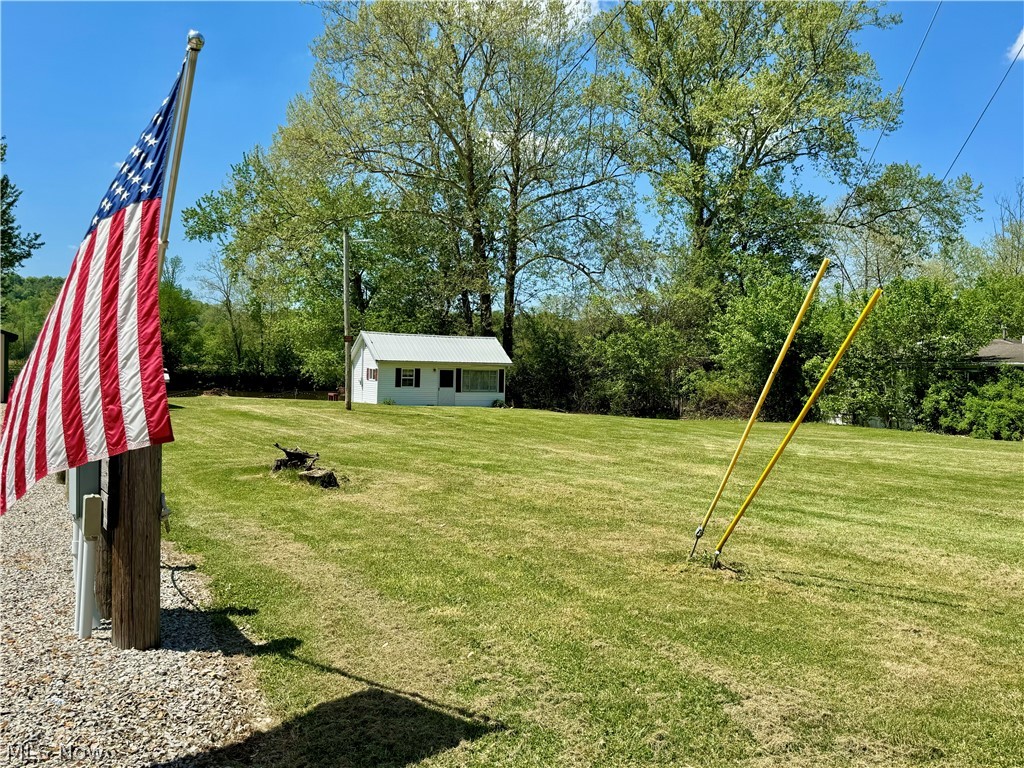 8551 South River Road Blue Rock, OH 43720 - Photo 35 of 43 View of yard with an outdoor structure