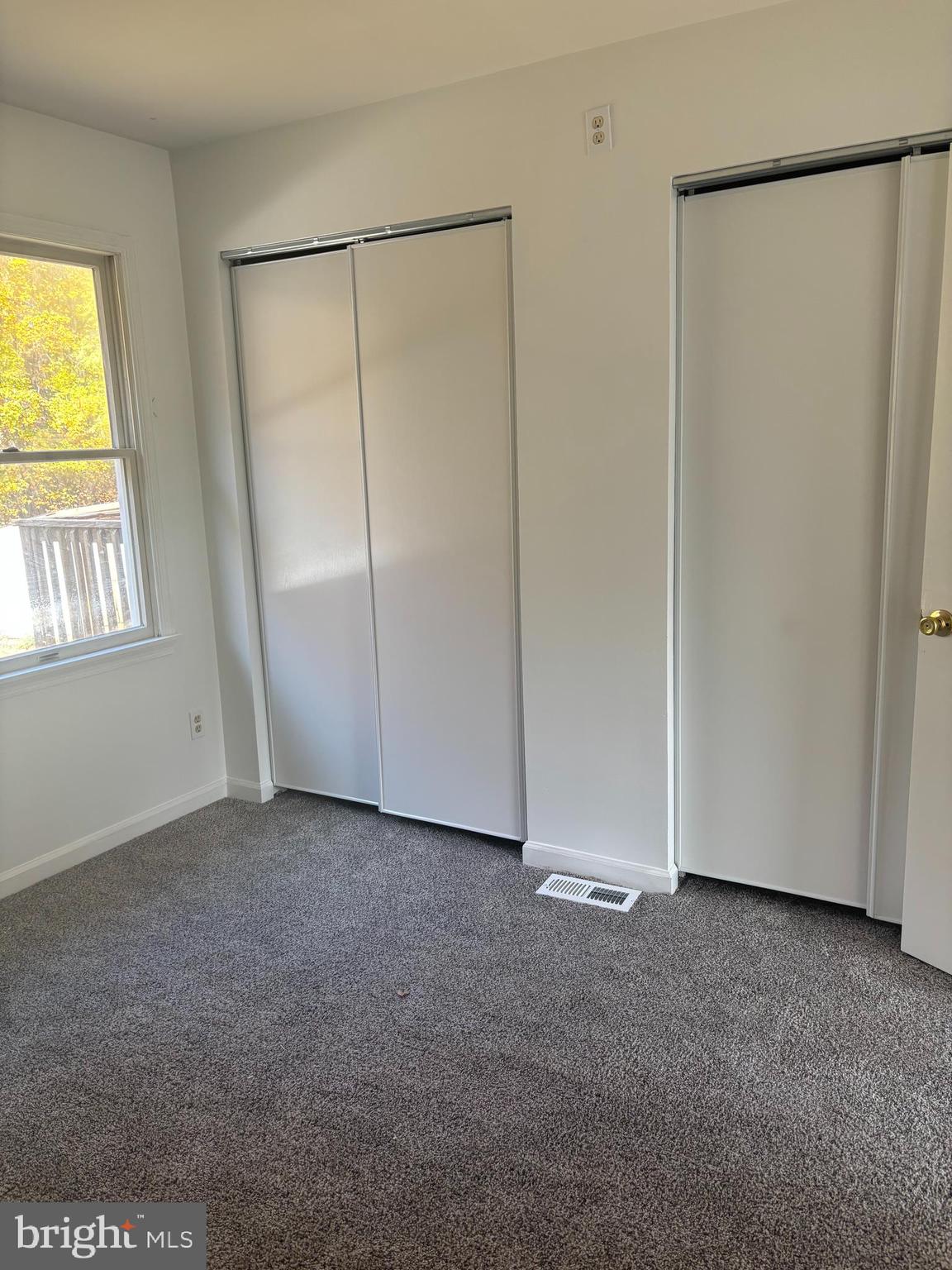 606 Gray Mt Circle Elkton, MD 21921 - Photo 7 of 13 a view of an empty room with a closet