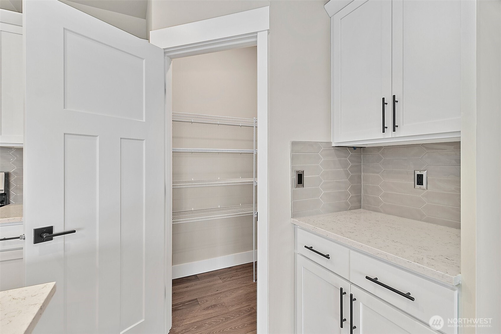 19129 Meridian Drive Southeast, Unit CW19 Bothell, WA 98012 - Photo 11 of 29 a view of walk in closet with wooden floor