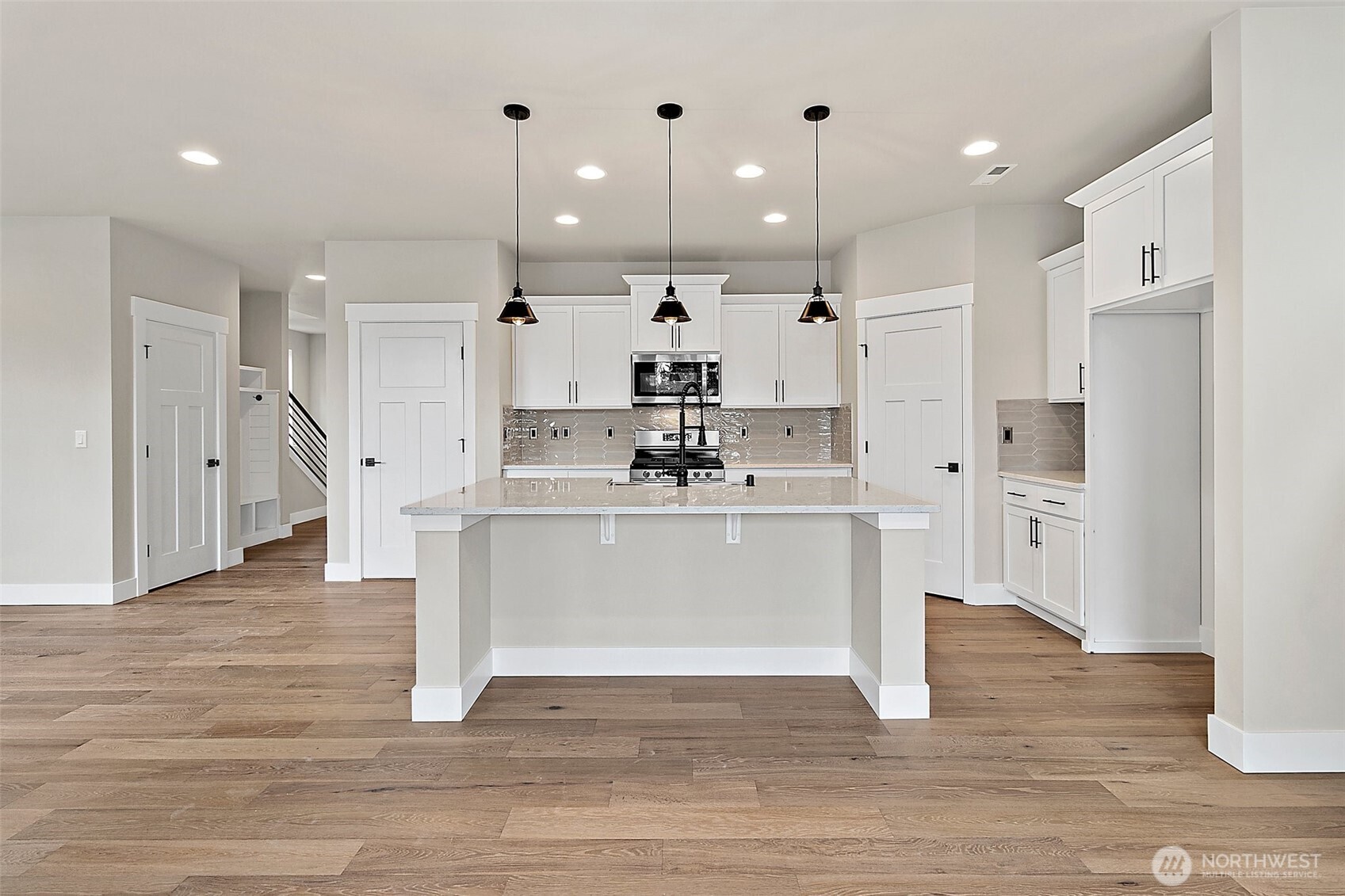 19129 Meridian Drive Southeast, Unit CW19 Bothell, WA 98012 - Photo 16 of 29 a view of kitchen with wooden floor