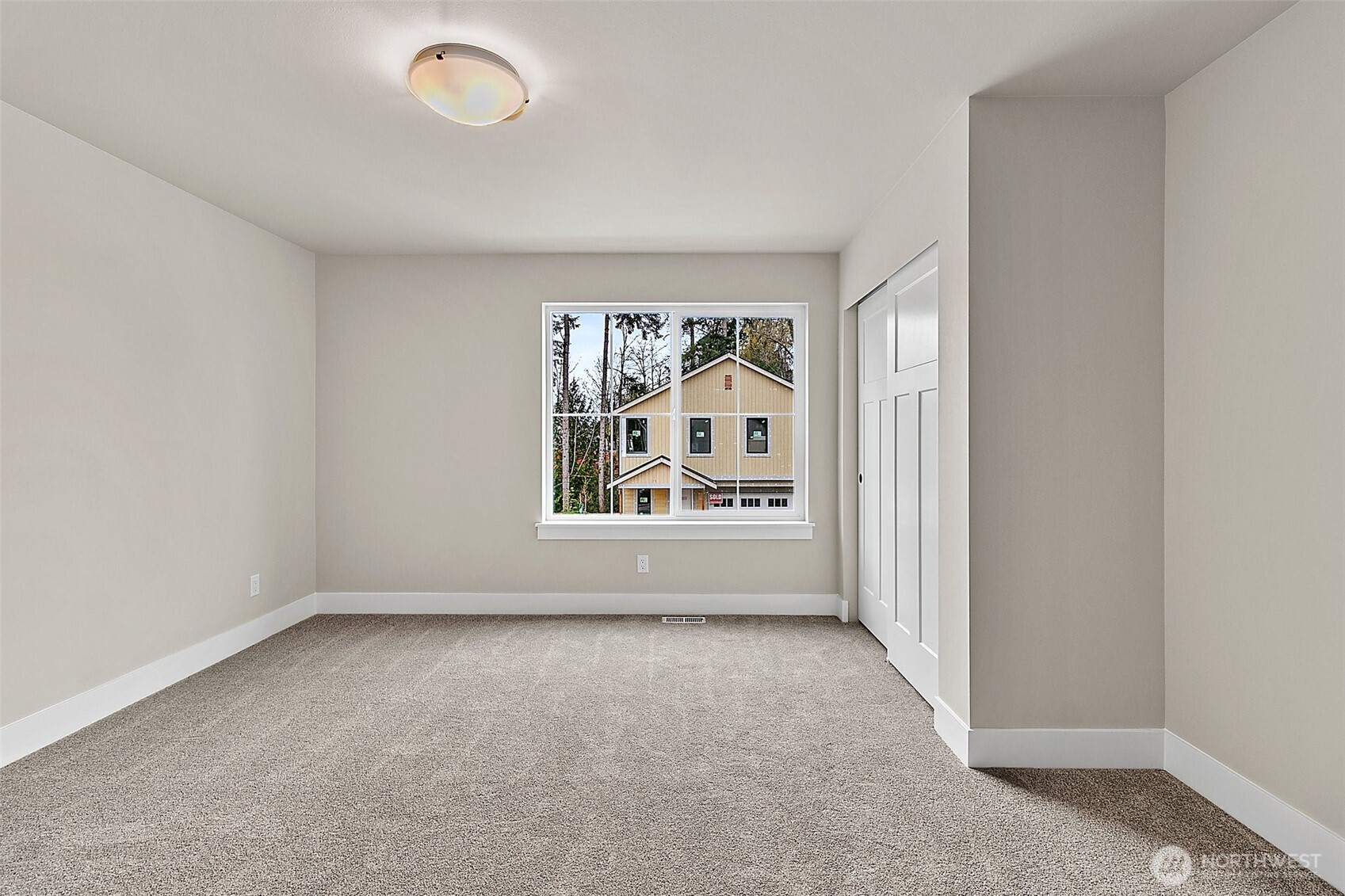 19129 Meridian Drive Southeast, Unit CW19 Bothell, WA 98012 - Photo 18 of 29 an empty room with windows