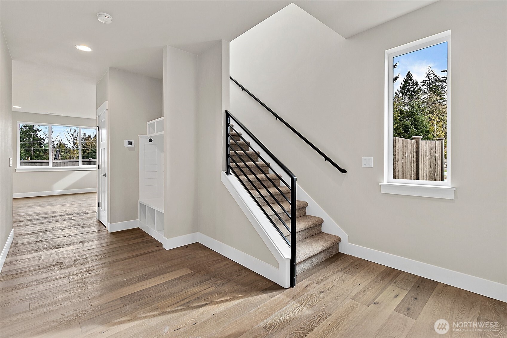 19129 Meridian Drive Southeast, Unit CW19 Bothell, WA 98012 - Photo 2 of 29 a view of entryway with wooden floor and stairs