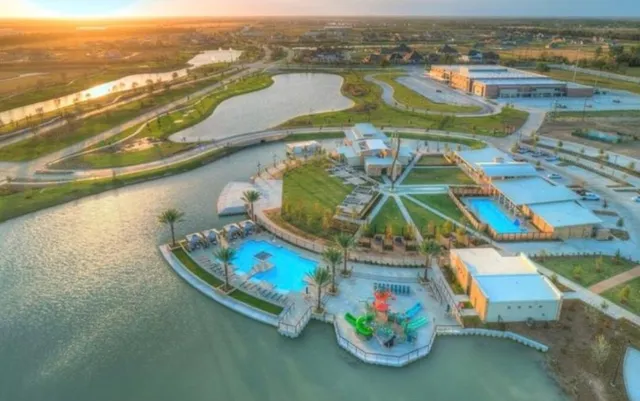 swimming pool view with a outdoor seating space
