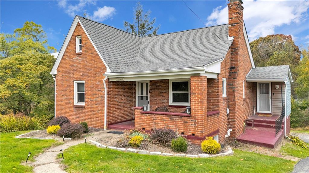 1002 Gringo Road Aliquippa, PA 15001 - Photo 2 of 6 a view of a house with yard