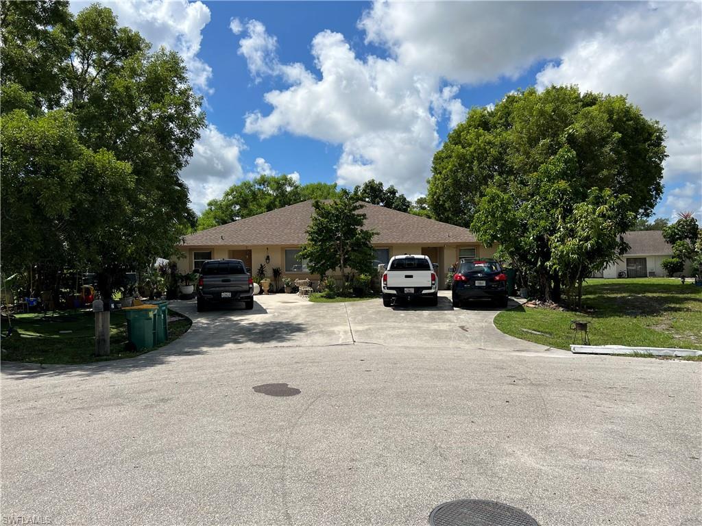 a car parked in front of a house