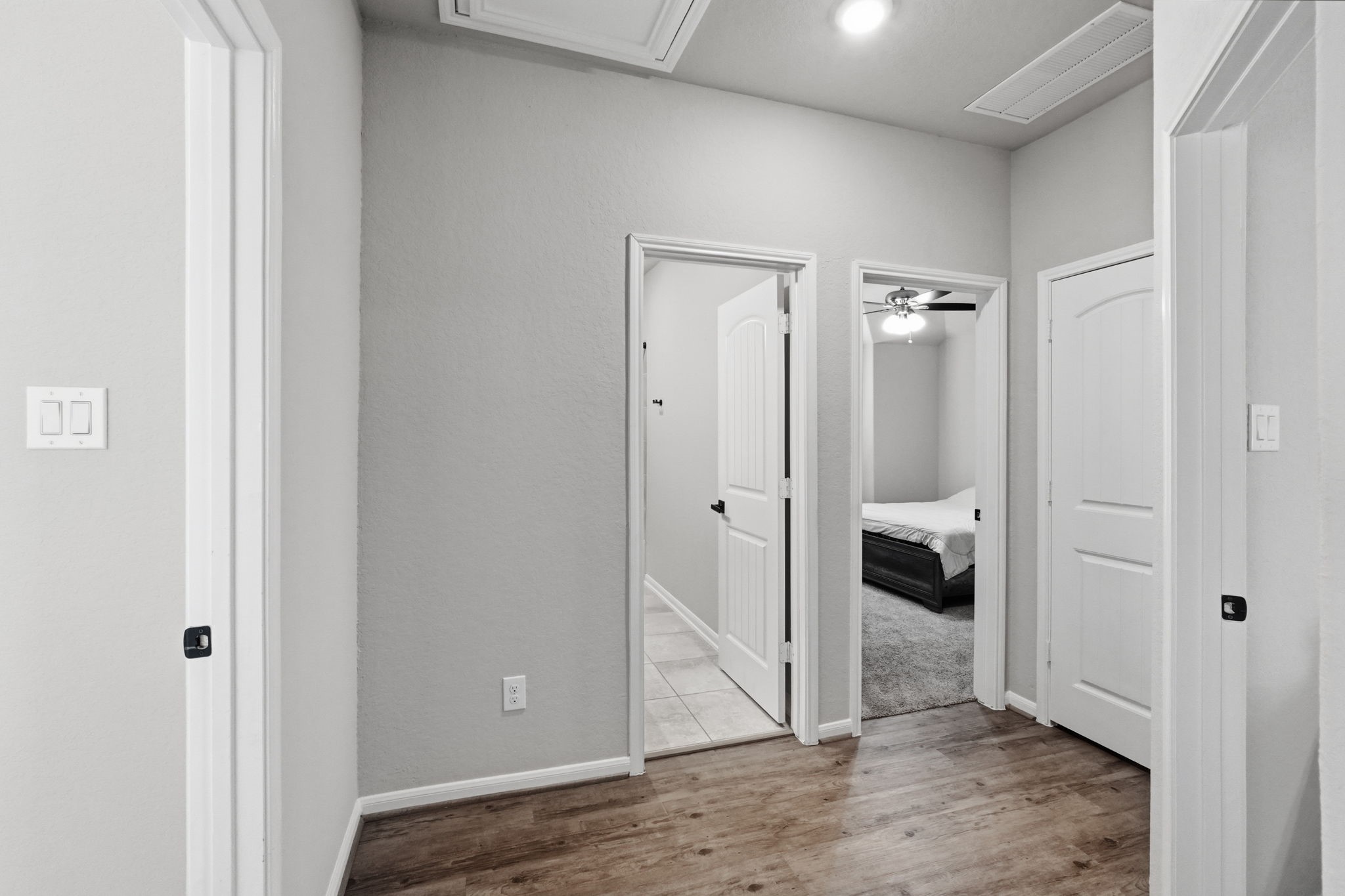 4334 Umber Shadow Drive Spring, TX 77386 - Photo 23 of 45 Access to the secondary bedrooms and full bath is conveniently positioned off the game room, creating a functional separation between living and private spaces.