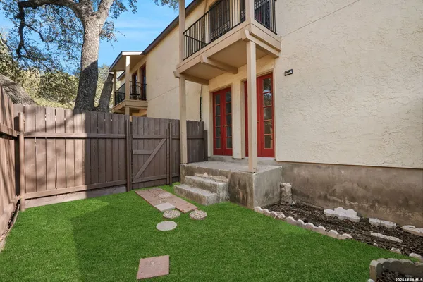 a view of a back yard of the house