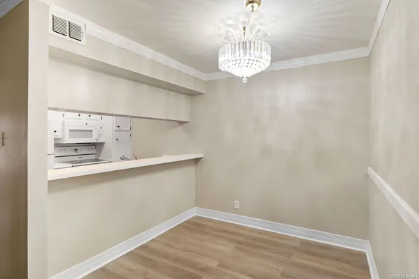 a view of kitchen and sink