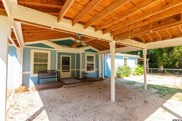 a front view of a house with a porch