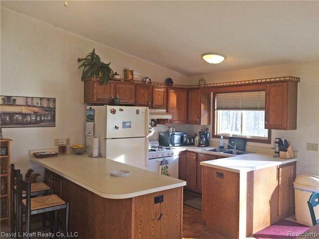 2823 Port Austin Road Port Austin, MI 48467 - Photo 2 of 12 2823PtAustinKitchen.jpg